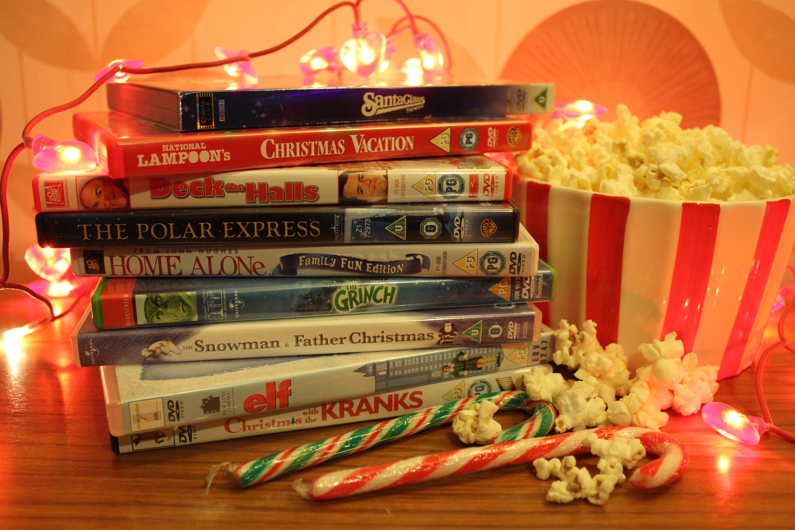 festive activity christmas film movie marathon with popcorn and candy canes