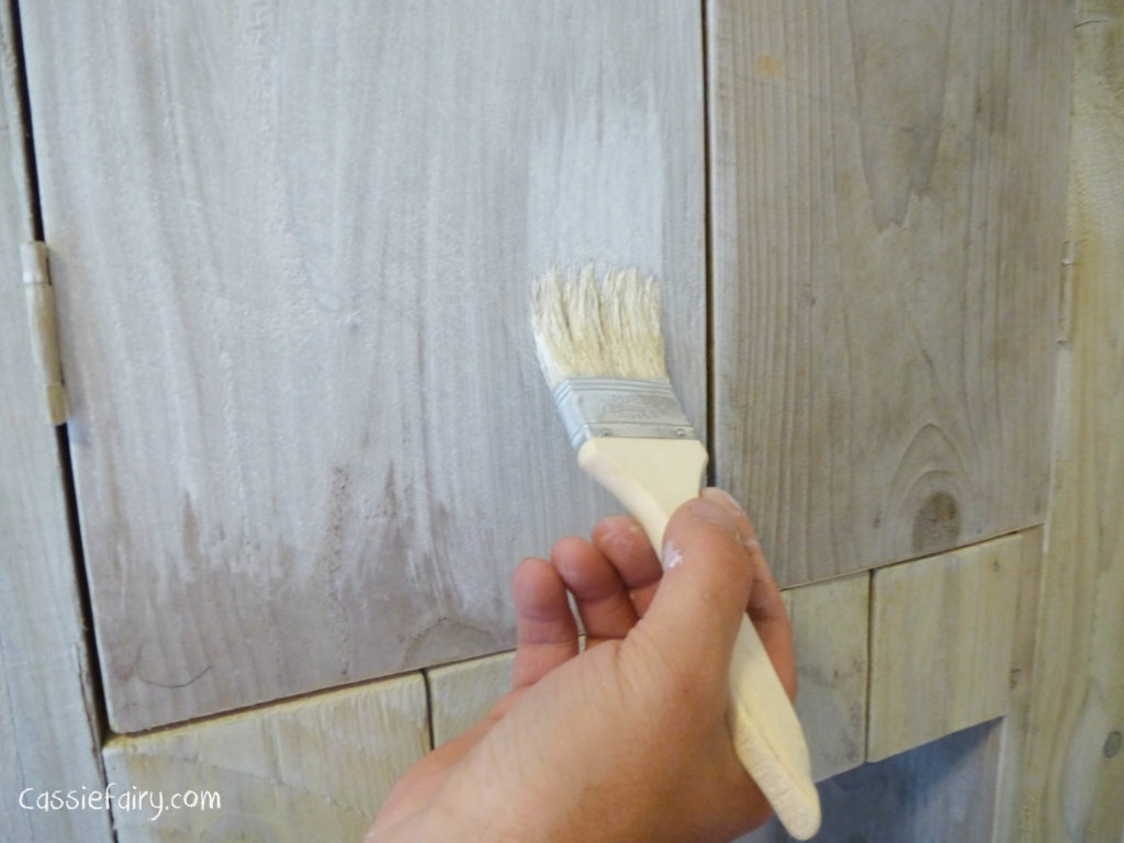 using recycled wood from a skip to make a beach hut bathroom floor and storage-11