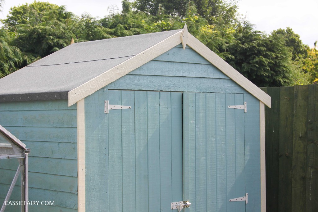 diy painting and installing small shed - duck egg blue beach hut in garden-21