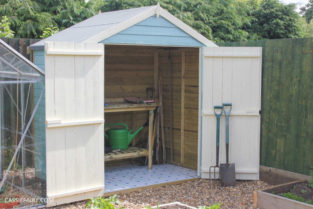 diy painting and installing small shed - duck egg blue beach hut in garden-24