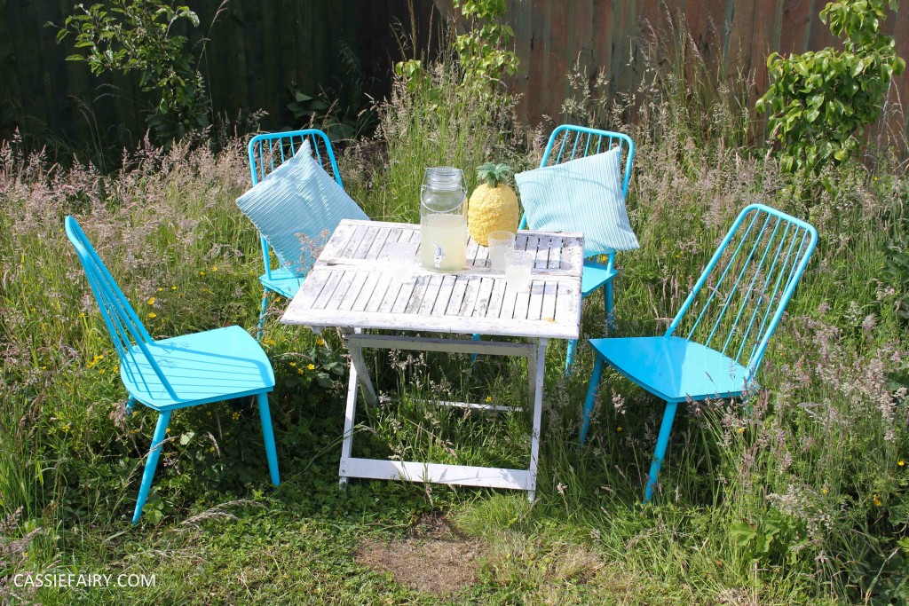 summer party - garden table and chairs in wild flower meadow-11