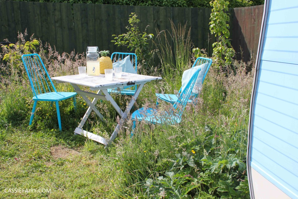 summer party - garden table and chairs in wild flower meadow-9