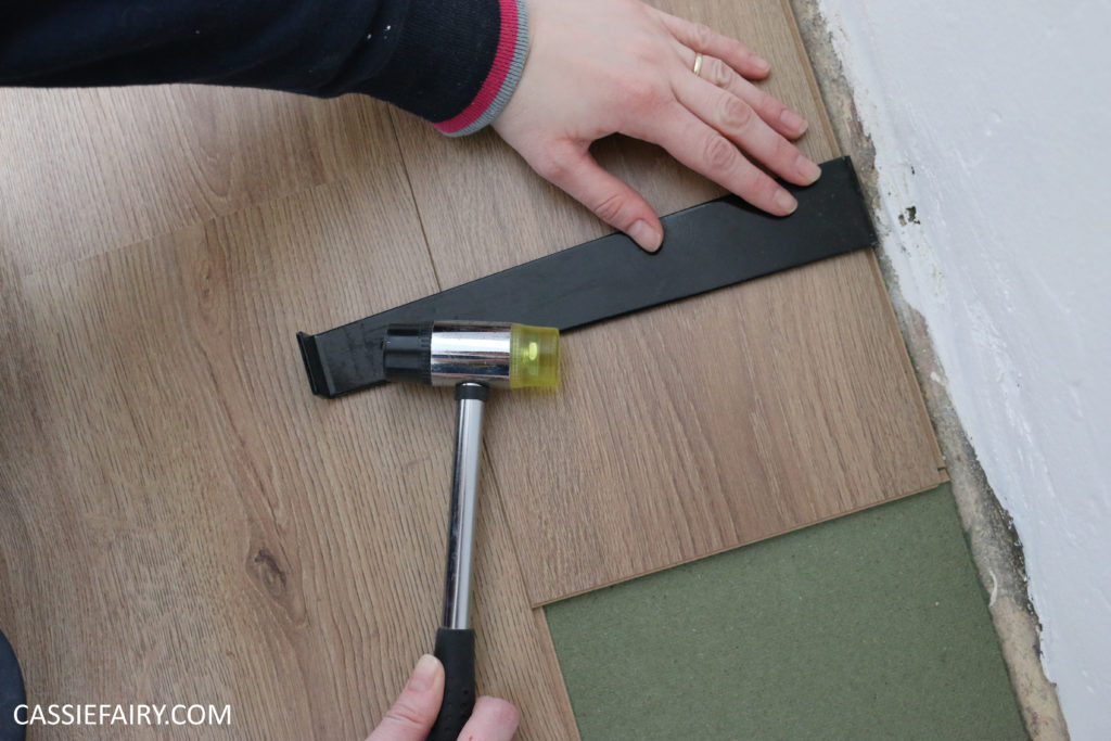 Laminate flooring being installed