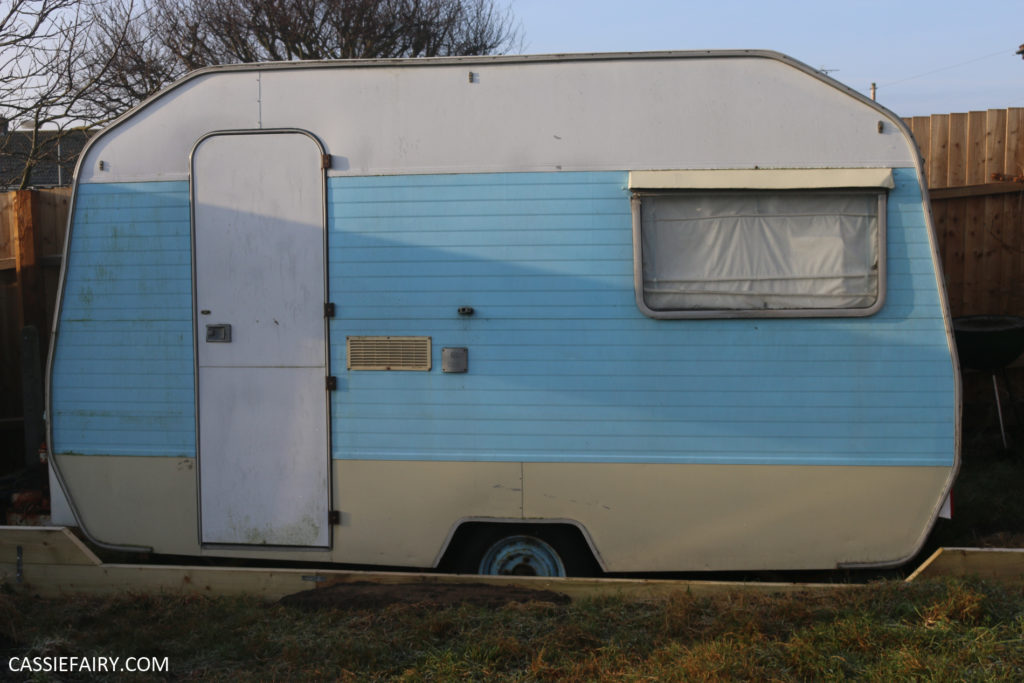 Pale blue vintage caravan