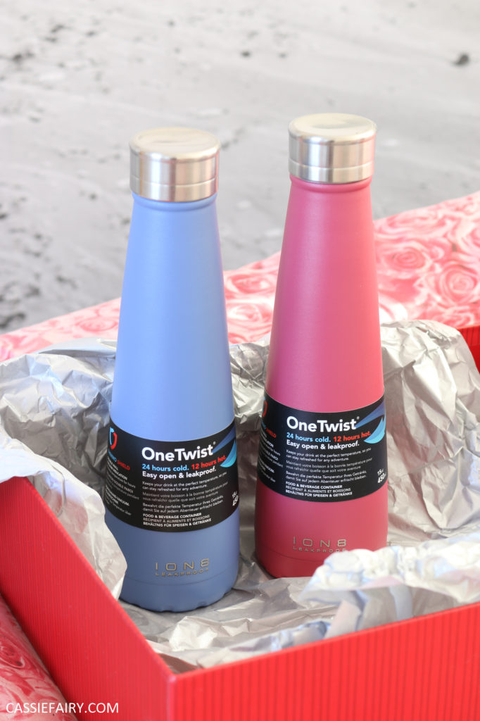 Photo of two flask bottles - one red, one blue