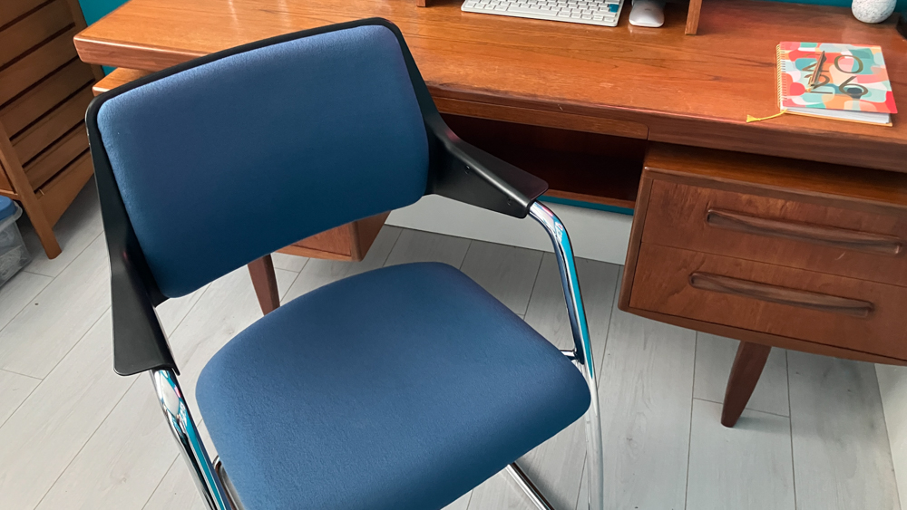 My teak G-Plan desk and a blue and chrome Girsberger desk chair.